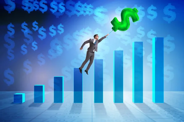 Üzletember repülő dollár jel felfújható léggömb felett pénzügyi — Stock Fotó