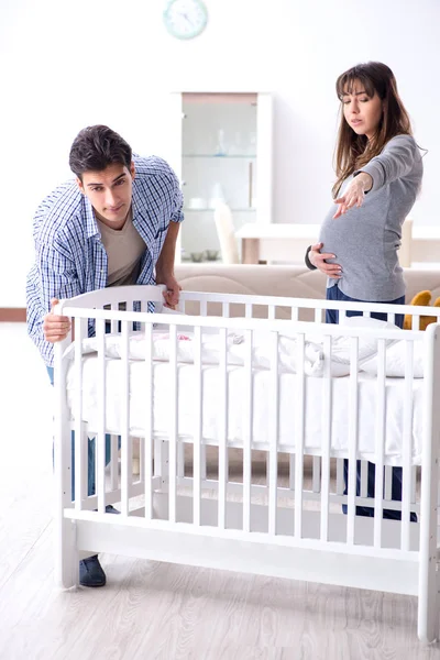 Young parents expecting their first baby — Stock Photo, Image