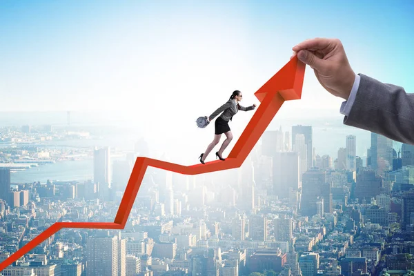 Businesswoman climbing line chart in economic recovery concept