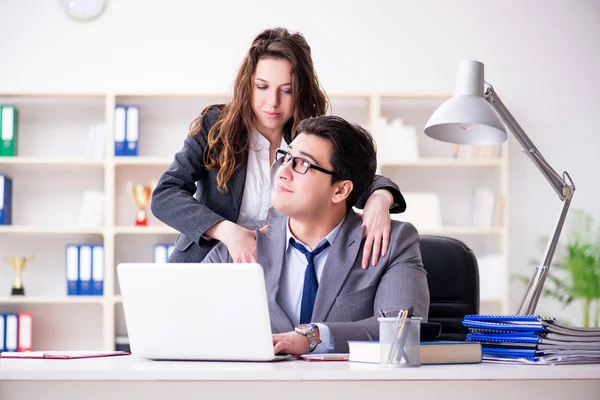 Sexual harassment concept with man and woman in office — Stock Photo, Image