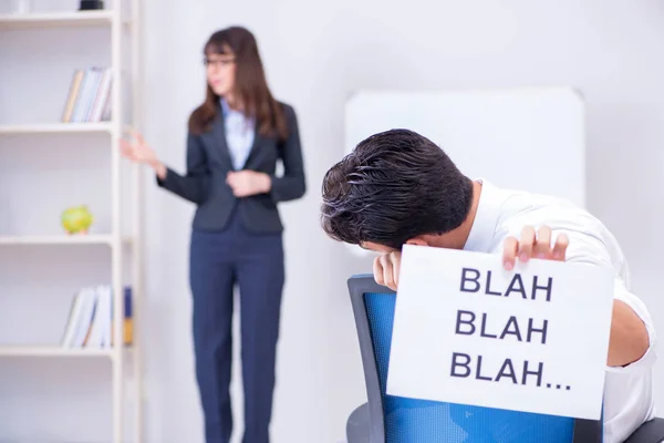 Employee bored at the business presentation — Stock Photo, Image