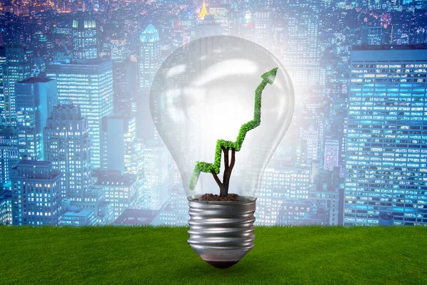 Grünes Energiekonzept mit grünem Liniendiagramm in Glühbirne — Stockfoto