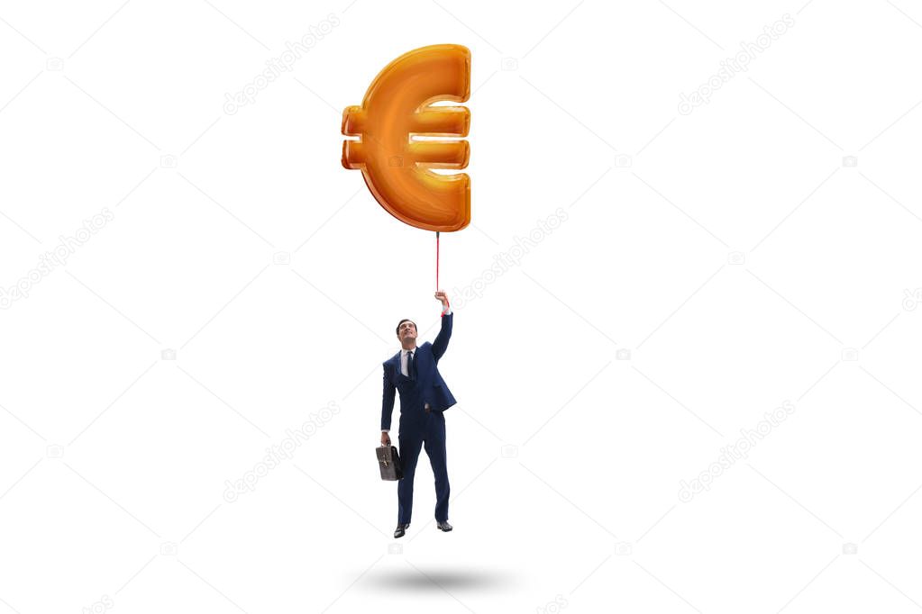 Businessman flying on euro sign inflatable balloon