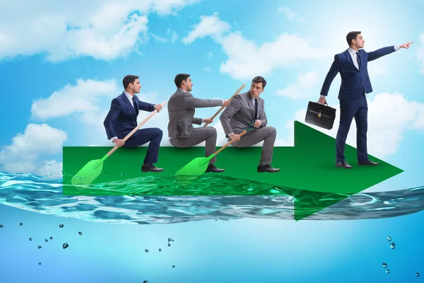 Teamwork concept with businessmen on boat — Stock Photo, Image
