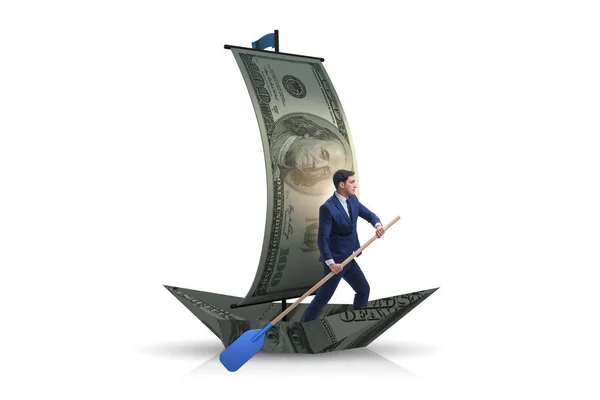 Бизнесмен грести на лодке доллара в бизнес-финансовой концепции — стоковое фото