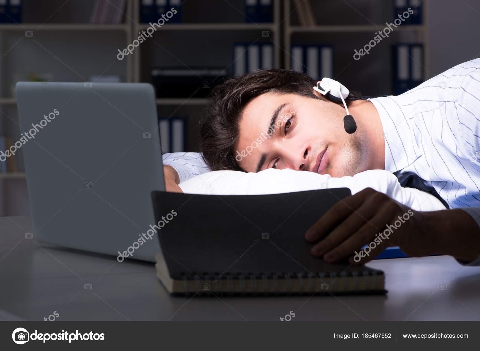 Tired And Exhausted Helpdesk Operator During Night Shift Stock
