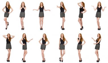 Beyaz izole gri elbiseli kızıl saçlı kız