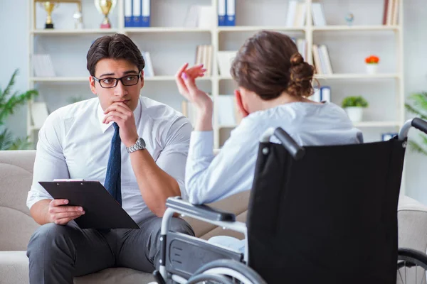 Patient visiting psychotherapist to deal with consequences of tr