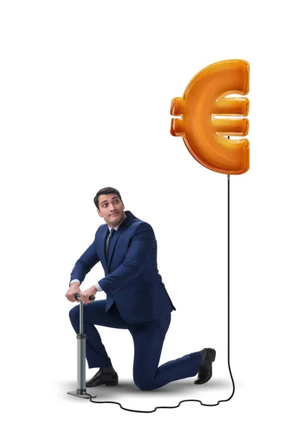 Empresario bombeando euro signo en concepto de negocio — Foto de Stock