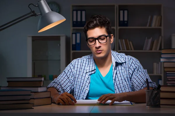 Student preparing for exams late night at home — Stock Photo, Image