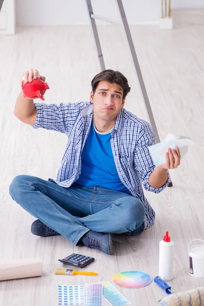 Young man overspending his budget in refurbishment project — Stock Photo, Image