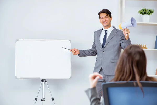 Business presentation in the office with man and woman — Stock Photo, Image