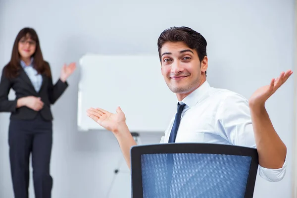 Business presentation in the office with man and woman — Stock Photo, Image