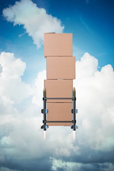 Концепция с доставкой коробок и ракет — стоковое фото