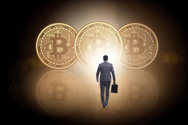 Cryptocurrency blockchai bitcoins doğru yürürken işadamı