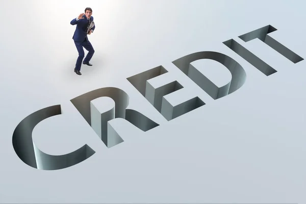 Businessman falling into trap of borrowing debt and credit — Stock Photo, Image