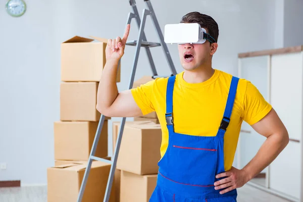 Painter contractor working with virtual reality goggles — Stock Photo, Image