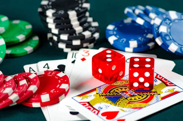 Chips and cards on casino table — Stock Photo, Image