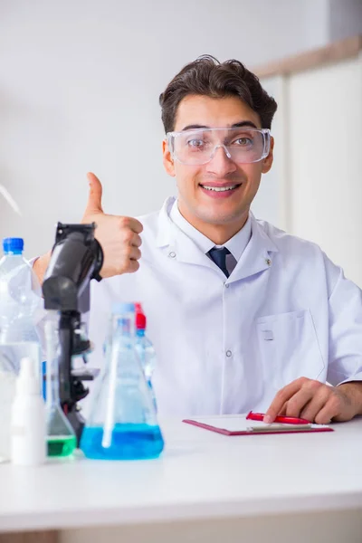 Lab assistant testing water quality