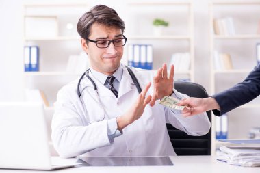 Rüşvet teklif edilen yolsuzluk konsepti doktoru.