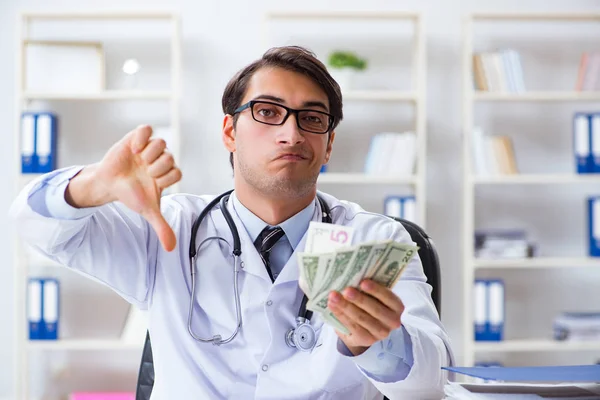 Doctor in corruption concept with being offered bribe — Stock Photo, Image