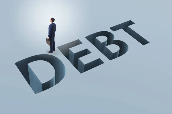 Businessman in debt and borrowing concept — Stock Photo, Image