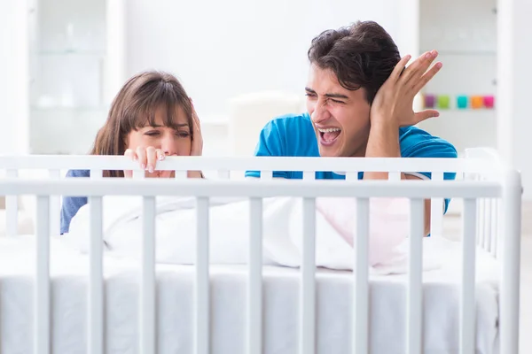 Young family frustrated at baby crying — Stock Photo, Image