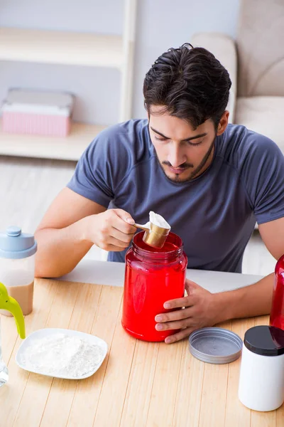 Athlete tasting new protein supplements for better muscles