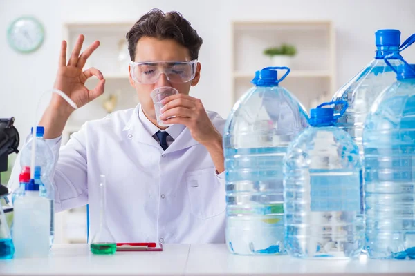 Lab assistant testing water quality