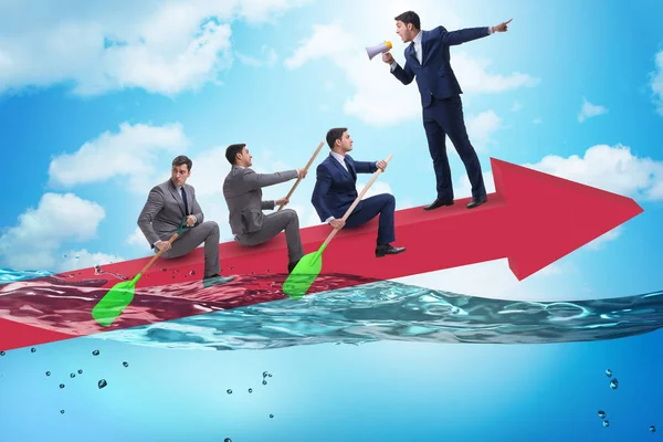 Teamwork concept with businessmen on boat — Stock Photo, Image