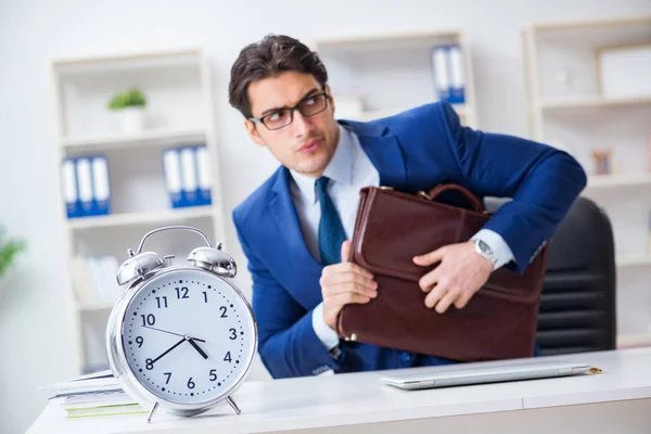 Businessman in bad time management concept