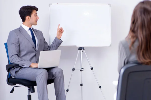 Business presentation in the office with man and woman — Stock Photo, Image