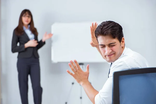 Business presentation in the office with man and woman — Stock Photo, Image