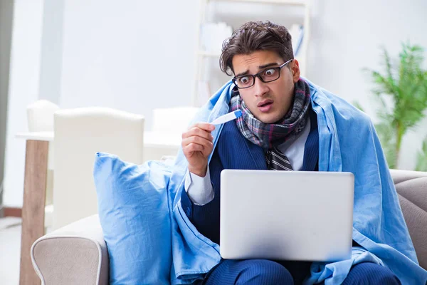 Sick businessman working from home due to flu sickness — Stock Photo, Image