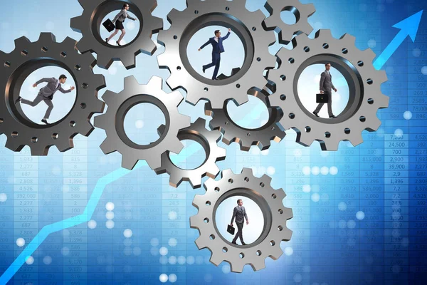 Teamwork concept with cogwheels and business people — Stock Photo, Image