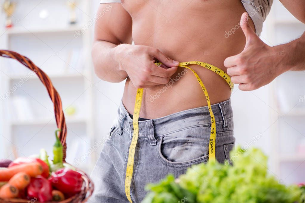 Young man in healthy eating and dieting concept