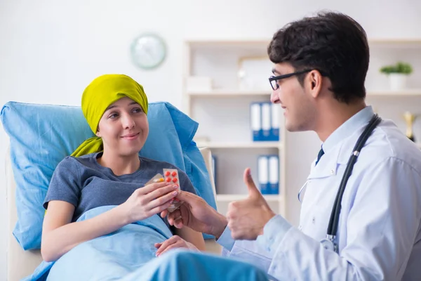 Cancer patient visiting doctor for medical consultation in clini