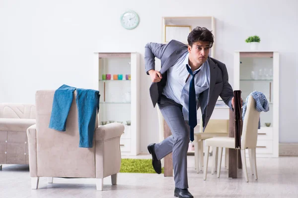 Businessman late for office due to oversleeping after overnight working — Stock Photo, Image