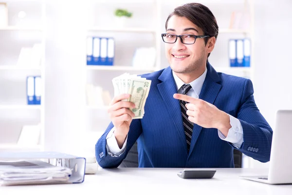 Accountant calculating dollars with calculator in office — Stock Photo, Image