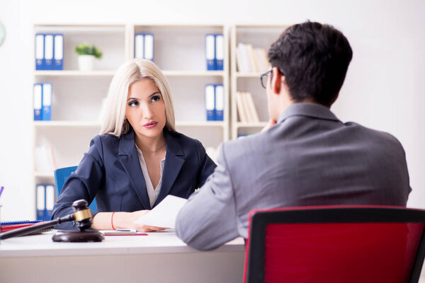 Lawyer discussing legal case with client