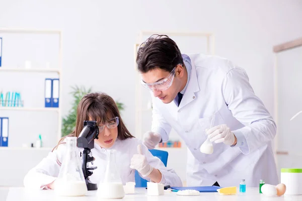 Two lab doctor testing food products — Stock Photo, Image