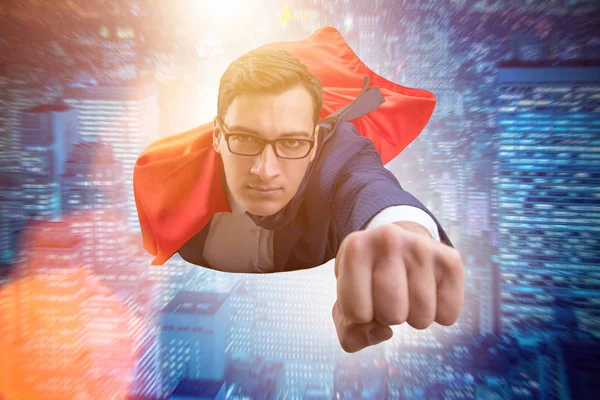 Flying super hero over the city — Stock Photo, Image