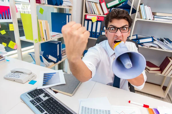 Busy frustrated businessman angry in the office