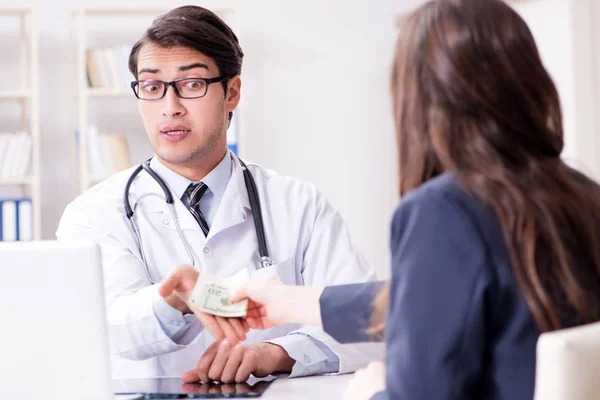 Doctor in corruption concept with being offered bribe — Stock Photo, Image