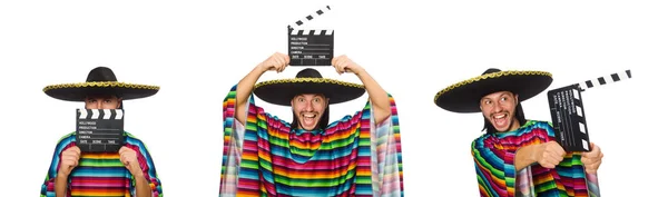 Bonito homem em poncho vívido segurando clapperboard isolado no wh — Fotografia de Stock