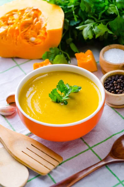 Pumpkin soup served on the table in bowl — Stock Image Pumpkin soup served on the table in bowl Stock Photo
