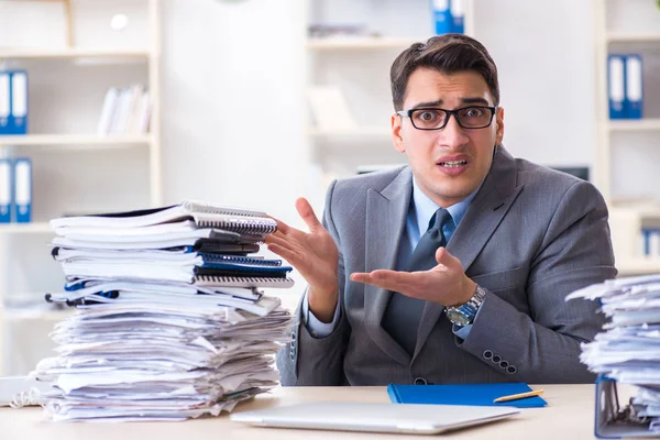 Overloaded with work employee under paperwork burden — Stock Photo, Image