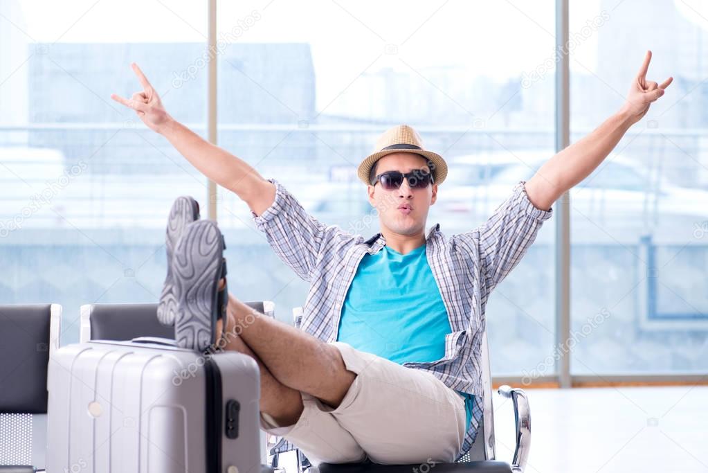 Young man travelling for his summer beach vacation