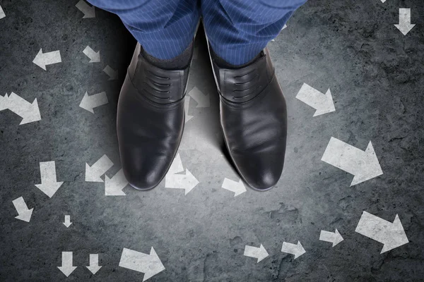 Businessman feet facing difficult choice dilemma — Stock Photo, Image