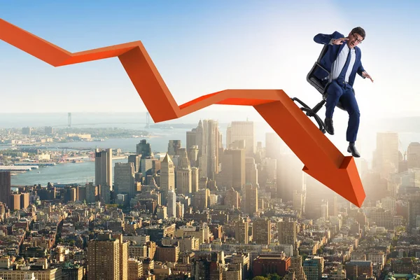 Zakenman glijdt naar beneden op stoel in economische crisis concept — Stockfoto